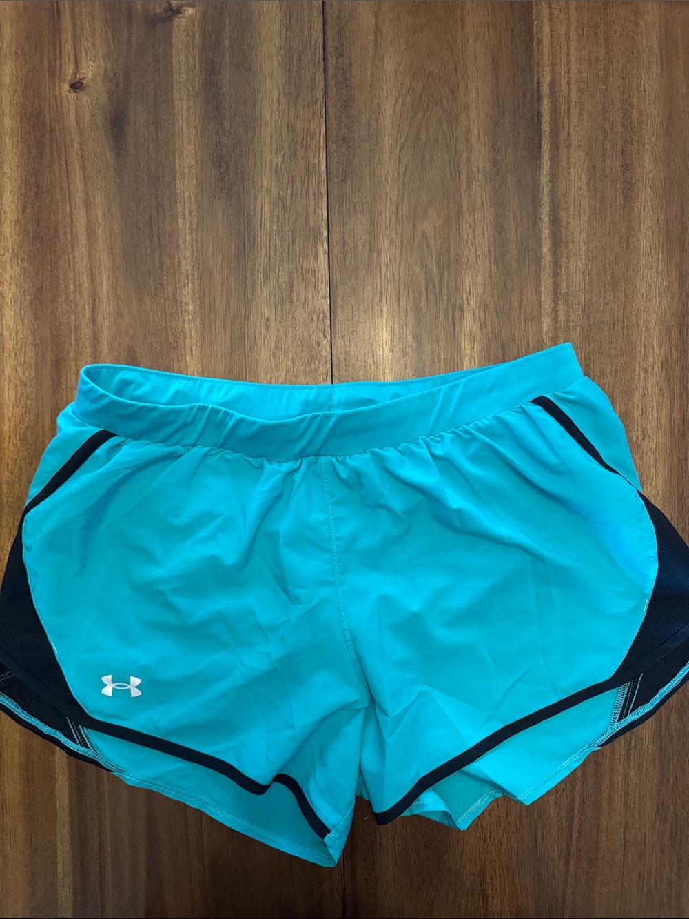 Under Armour Women’s Turquoise Athletic Running Shorts with Black Trim